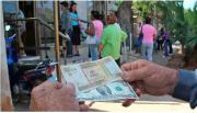 El peso llega a mínimo histórico; la dolarización gana terreno