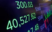 Wall Street en verde, ante una posible baja de tasas de interés