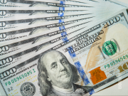 El dólar cerró a $1460 y las acciones subieron hasta 50%