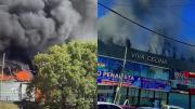Otro voraz incendio: Bomberos intentan apagar las llamas en un centro comercial de Villa Celina