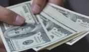 Espinoza asegura que el dólar seguirá bajando y que la tendencia está dentro de lo previsto