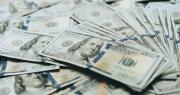 El dólar oficial llega a Bs 11,90 para este martes tras subir 90 centavos