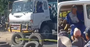 El chofer de una grúa rompe un punto de bloqueo y provoca una reacción violenta de micreros