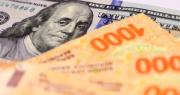 Cuál es el valor del dólar que mantiene vivo al carry trade y qué bonos elegir