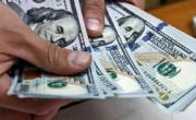 A cuánto cotizan el dólar oficial y el blue tras la suba del lunes