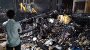 Tragedia aérea en la India: familiares de los fallecidos recibieron cuerpos equivocados