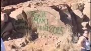 Indignante: filmaron en la Ruta 7 a dos turistas que pintaban grafitis en un atractivo natural