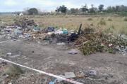 Encontraron un cuerpo calcinado y con una soga en el cuello en un descampado