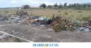 Hallaron un cuerpo calcinado y con una soga en el cuello en un descampado