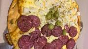 Una pizza grande por $13.000 en este mítico bodegón