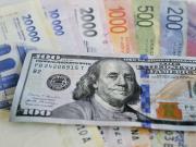 Se frenó la escalada del dólar y bajó a $ 1.450, mientras vuelan los bonos y acciones