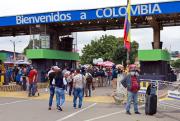 Migrantes venezolanos en Colombia enfrentan trabas legales