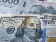 El dólar bajó a 1.415 pesos y cayeron las reservas por pagos de deuda