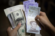 Dólar oficial aumentó apenas 0,19% este martes y se ubicará en Bs.243,57 este #26Nov