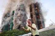 Al menos 36 muertos y 279 desaparecidos por incendio en Hong Kong que arrasó tres torres de complejo de rascacielos