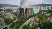 Sube a 128 la cifra de muertos por el incendio en un complejo residencial en Hong Kong