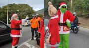 Inesperado encuentro: El video viral del Grinch apareciendo de sorpresa en la Cota Mil, así reaccionó Santa