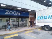Zoom paga remesas en bolívares y dólares