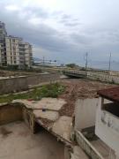 Demolición del Centro América causó daños al edificio vecino