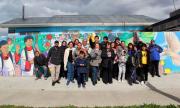 Vecinos del Barrio Juan Pablo II inauguran mural