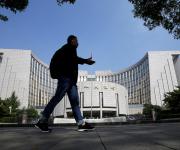 Banco central chino se compromete a recortar coeficientes de reserva y tasas de interés en 2026