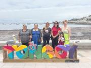 Resignadas a lo que ordena la naturelaza, mujeres de Tongoy esperan volver pronto a faneas en el mar