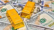 Oro alcanza récord histórico ante el debilitamiento del dólar