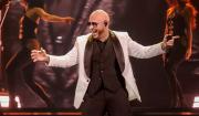 Pitbull intentará batir el récord Guinnes del mayor número de calvas postizas durante su concierto en Londres