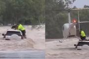 En medio de las inundaciones, un policía arriesgó su vida para rescatar a un perro atrapado en un auto –