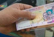Serie B: cambio de billetes arranca con dudas en el comercio y canje limitado