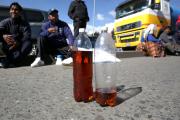 Transportistas suspenden bloqueos tras pactar control de calidad de carburantes