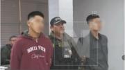 Policía presenta a 2 aprehendidos por mujer quemada y decapitada