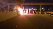 Policía dispersa con gases a bloqueadores acusados de amenazar con saqueos