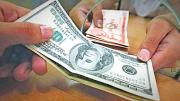 Dólar oficial baja a Bs 11,52 y mantiene su tendencia descendente
