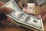 Dólar oficial baja a Bs 9,83 y vuelve a situarse por debajo de los Bs 10