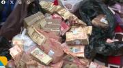 Hallan fajos de billetes en tres maletas dentro de la ambulancia que salió del condominio de Mariaca